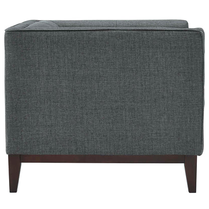 Rear view of two gray fabric armchairs with dark wood tapered legs in a mid-century modern style.
