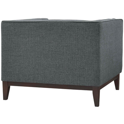 Pair of grey fabric armchairs with dark wood legs and square cushions, mid-century modern style.
