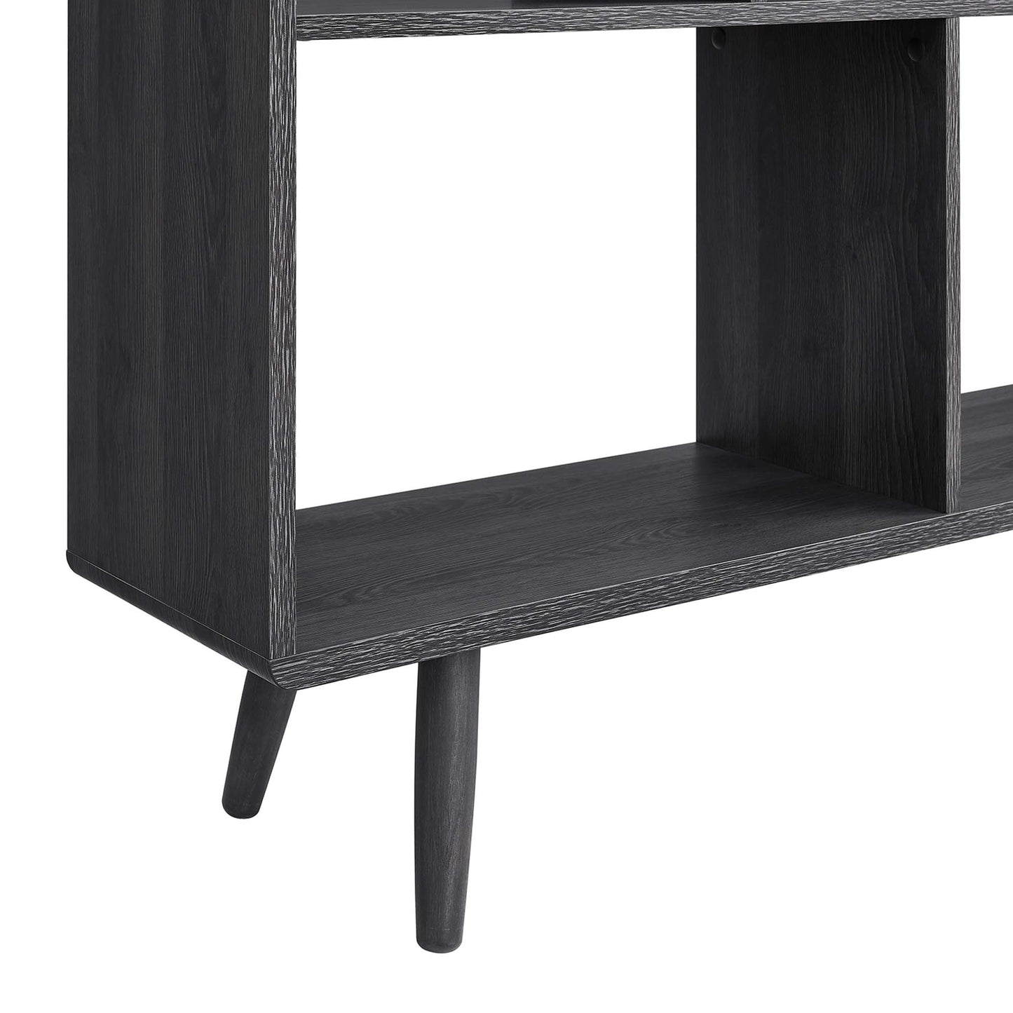 Dark charcoal wood-grain 7-shelf bookcase with tapered mid-century legs.
