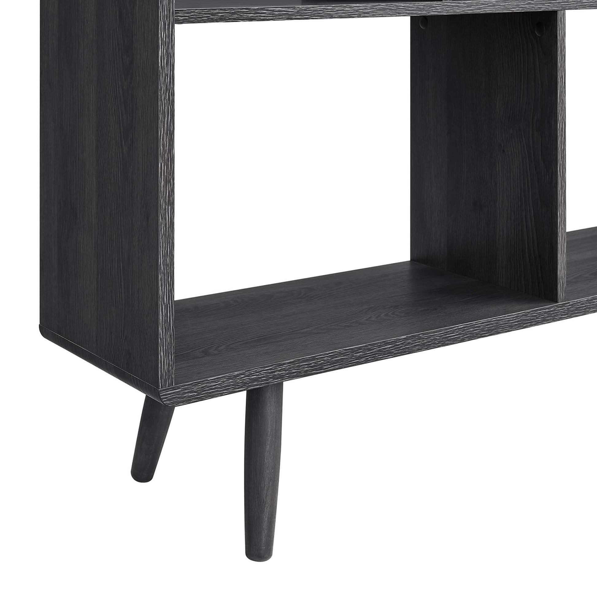 Dark charcoal wood-grain 7-shelf bookcase with tapered mid-century legs.