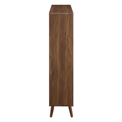 Walnut-finish 7-shelf wood-grain bookcase with slim profile, mid-century modern style, raised tapered legs.