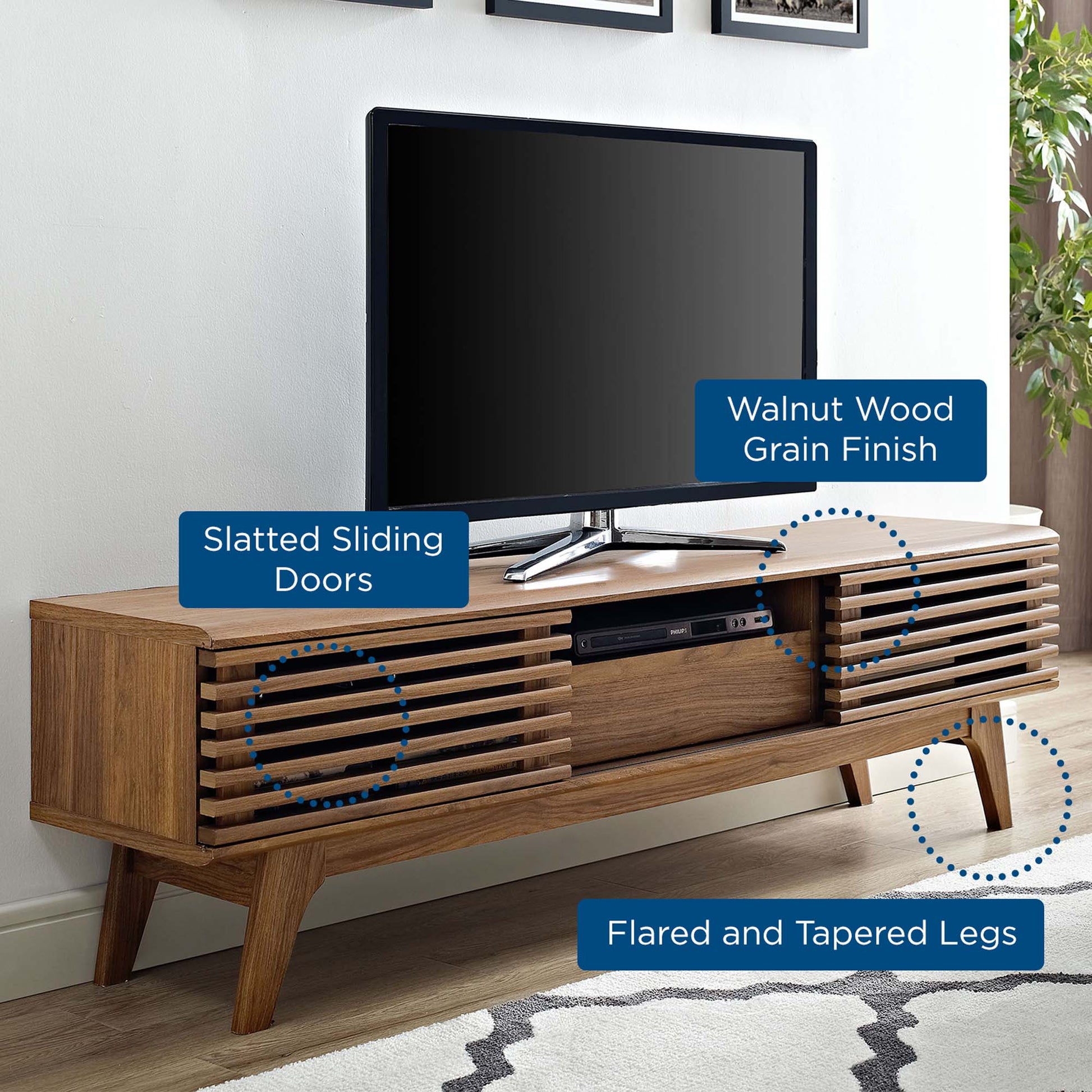 Walnut wood grain finish TV console with slatted sliding doors & flared tapered legs.