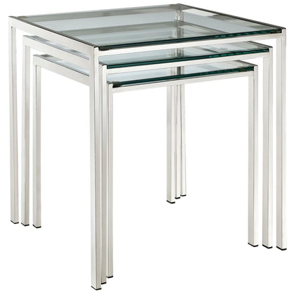 Set of three silver nesting tables with glass tops and square frames, modern minimalist style.