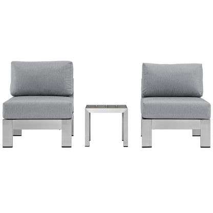 Three-piece outdoor aluminum sectional sofa set with grey cushions and metal frames, shown with a small square metal side table.