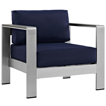 Modern silver aluminum outdoor patio 3-piece set with navy cushions; modular pieces with squared low-profile frames.