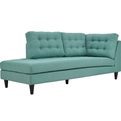 Teal fabric left-facing bumper sectional with tufted back cushions and dark tapered legs