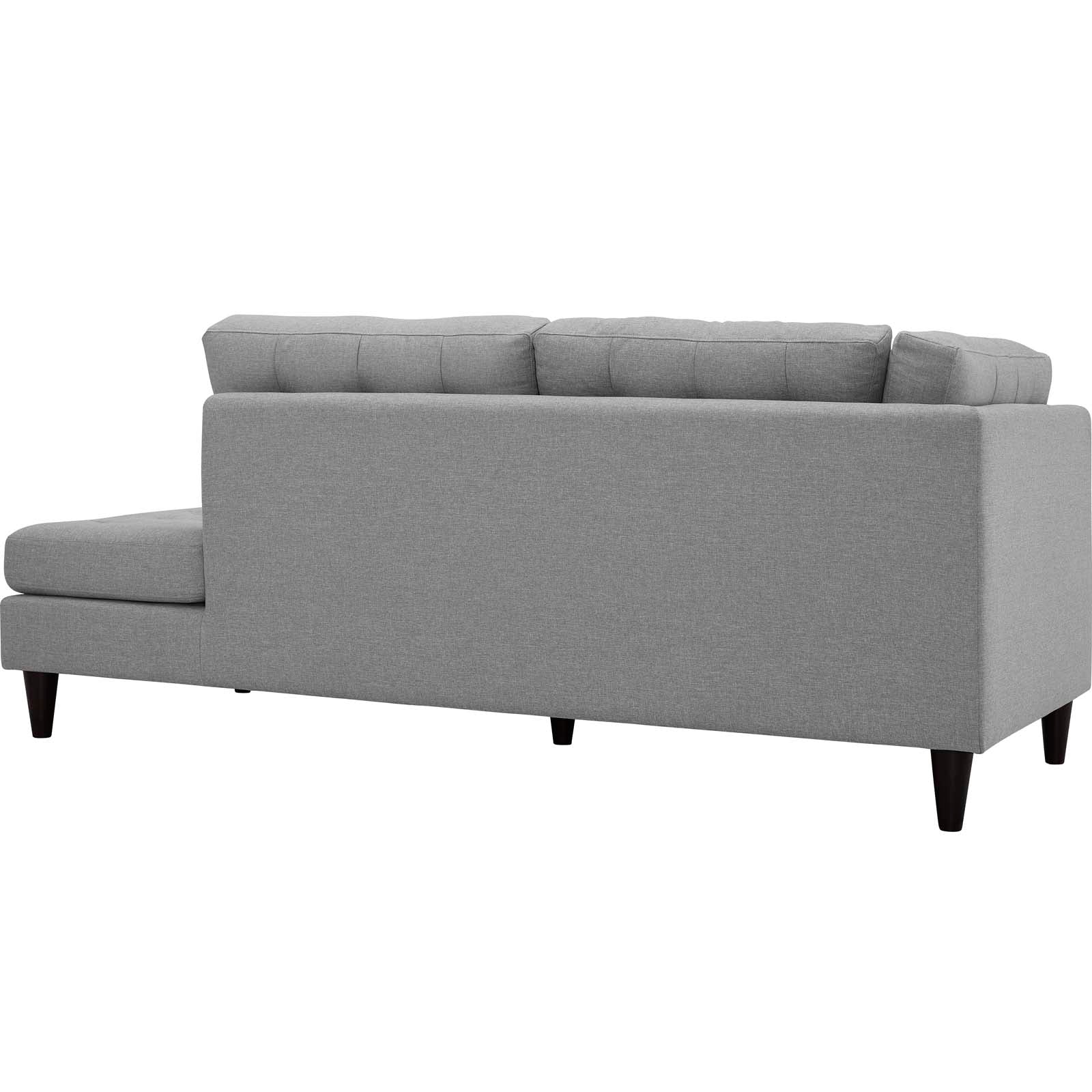 Gray fabric right-facing sectional with a bumper end, high back cushions, and tapered dark legs.