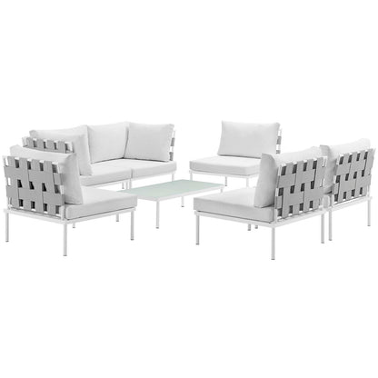 White aluminum outdoor sectional sofa set with gray cushions and a glass-top coffee table.