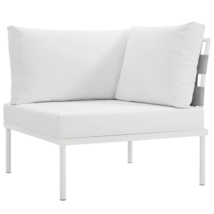 White aluminum outdoor sectional sofa set with thick white cushions and grey strap accents for a modern patio look.