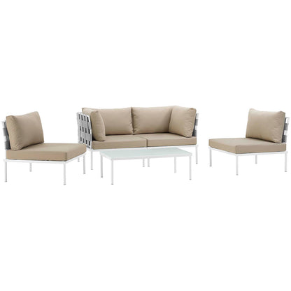 Beige outdoor lounge set with white metal frames, gray lattice accents, beige cushions, and glass-top coffee table.