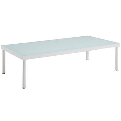 Outdoor aluminum sectional sofa set with white and beige cushions and a rectangular coffee table.