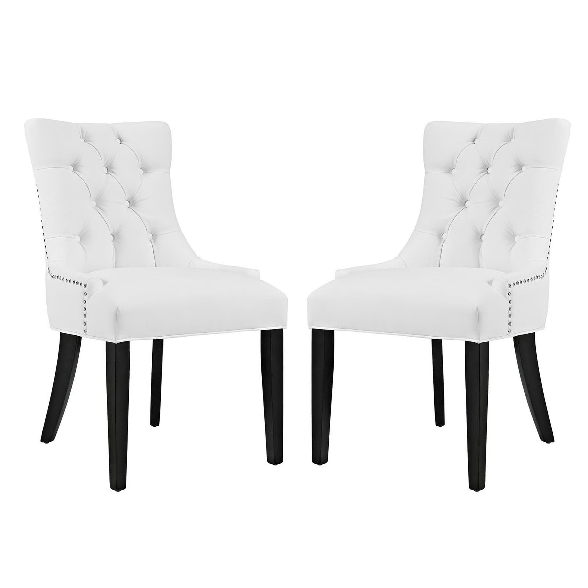 Pair of white tufted dining chairs with button tufting, nailhead trim, dark wood legs.