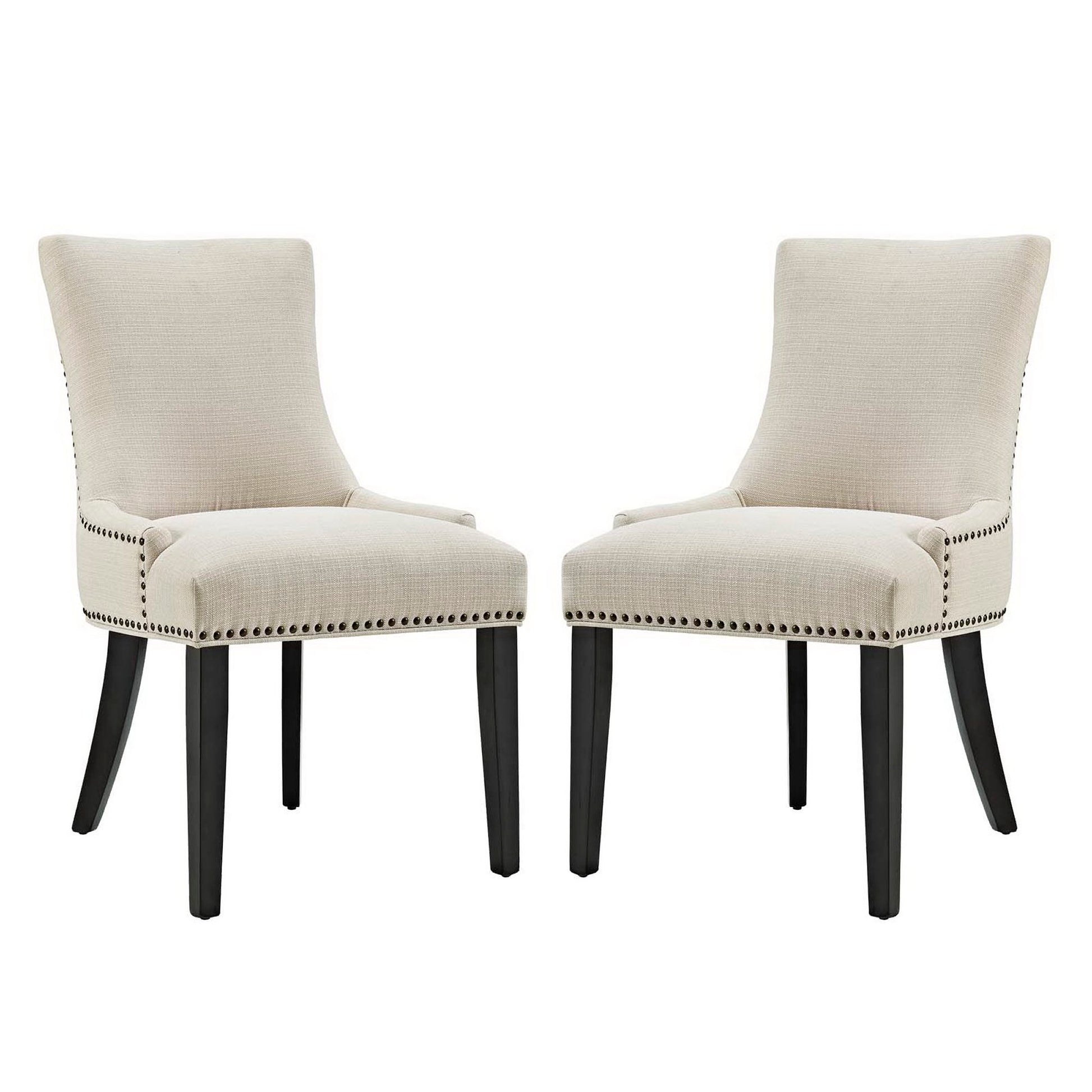 Pair of beige upholstered dining chairs with dark wood legs, curved backs, and nailhead trim.
