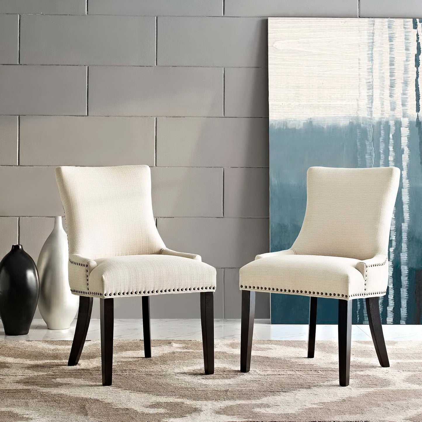 Brown upholstered dining side chairs with dark espresso legs, curved back and nailhead trim; set of two.