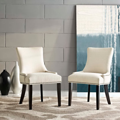 Brown upholstered dining side chairs with dark espresso legs, curved back and nailhead trim; set of two.