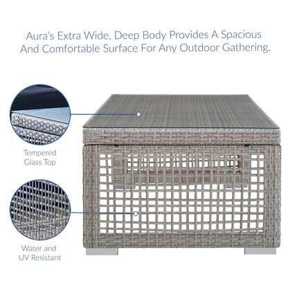 Gray woven outdoor coffee table with tempered glass top; water and UV resistant, square extra-wide patio centerpiece.