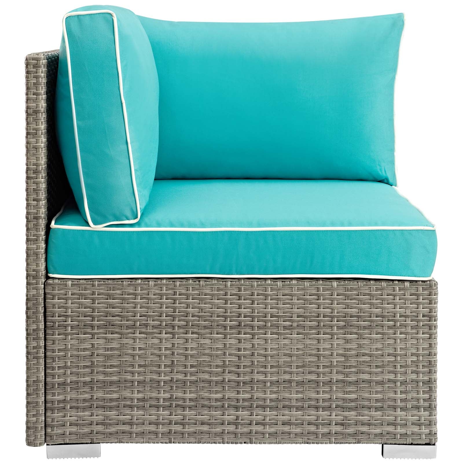 Grey wicker outdoor patio corner chair with turquoise cushions and white piping.