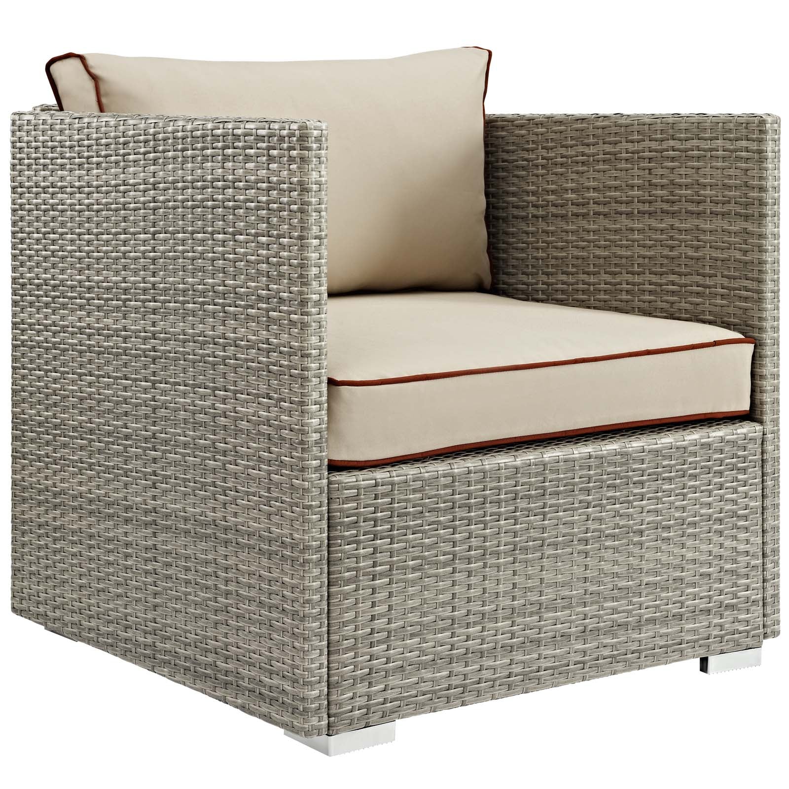 Beige cushioned outdoor wicker armchair with brown piping, gray woven rattan, cube-style seating.
