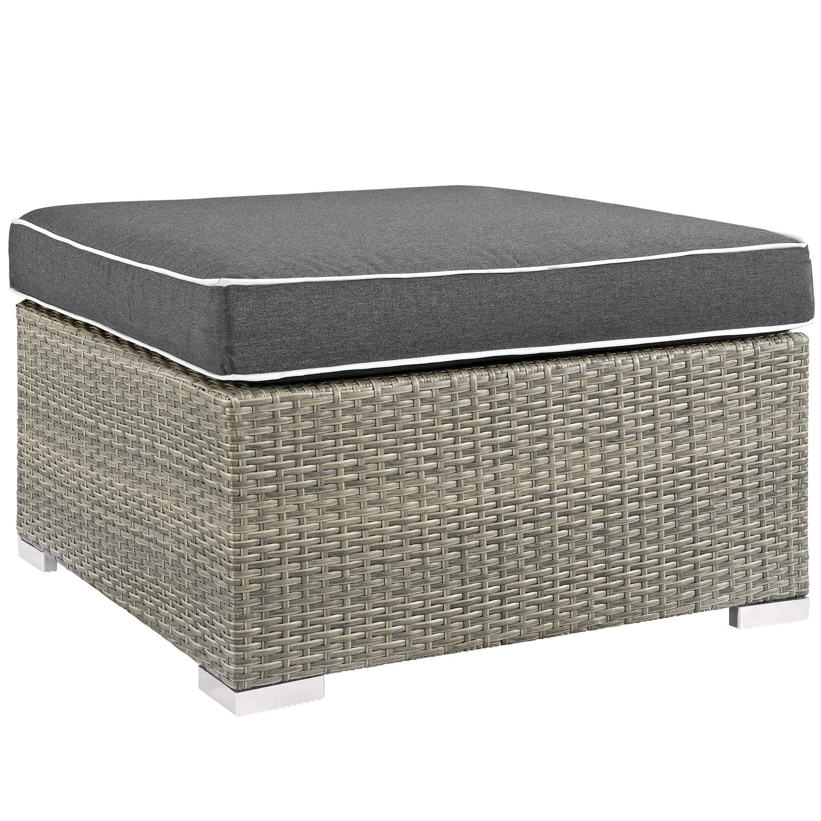 Rectangular outdoor upholstered fabric ottoman with charcoal cushion.