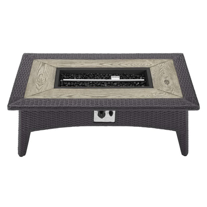 Dark wicker rectangular fire pit coffee table with a faux-wood inset & glass-bead lava rock burner.