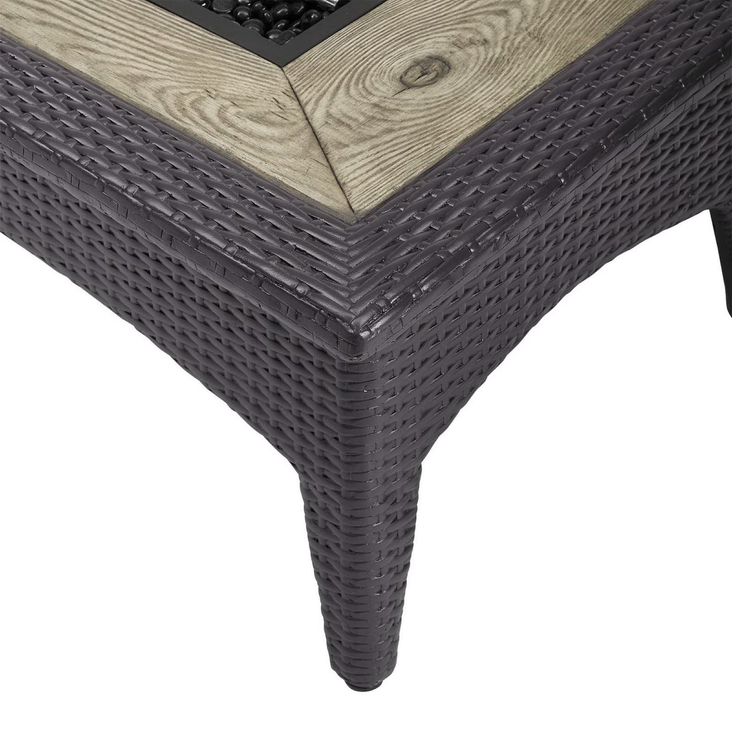 Dark brown woven outdoor wicker rectangular fire pit table with a light wood-look top and built-in fire pit.