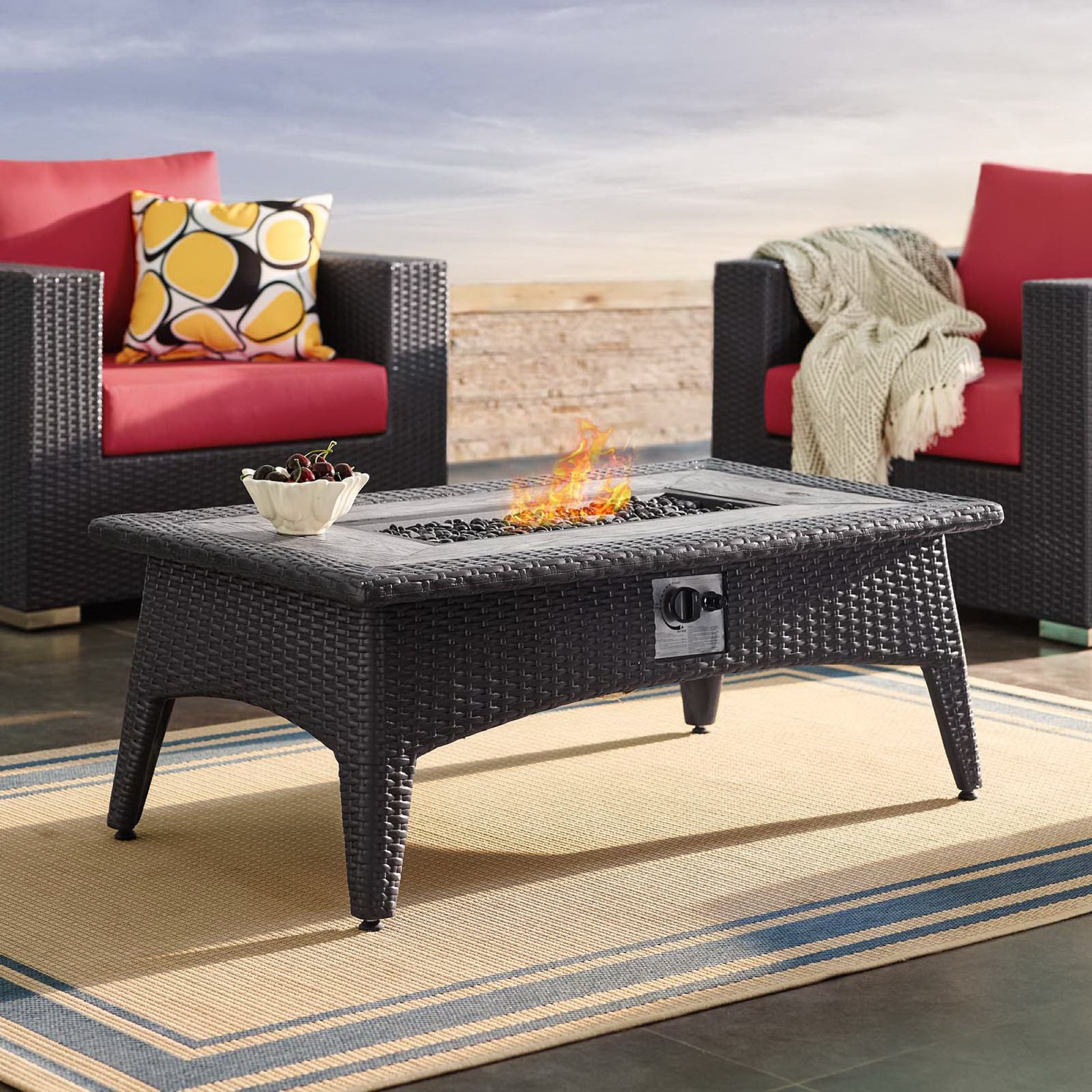 Espresso rectangular outdoor fire pit table with visible flame.