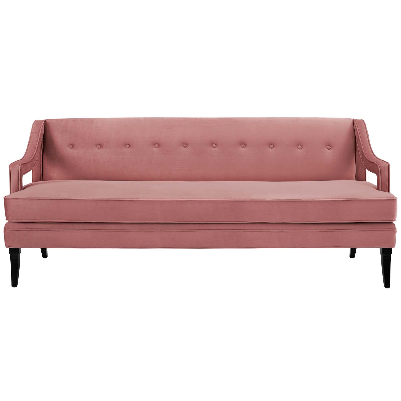 Dusty rose velvet sofa with button tufting, curved arms, and black tapered legs.