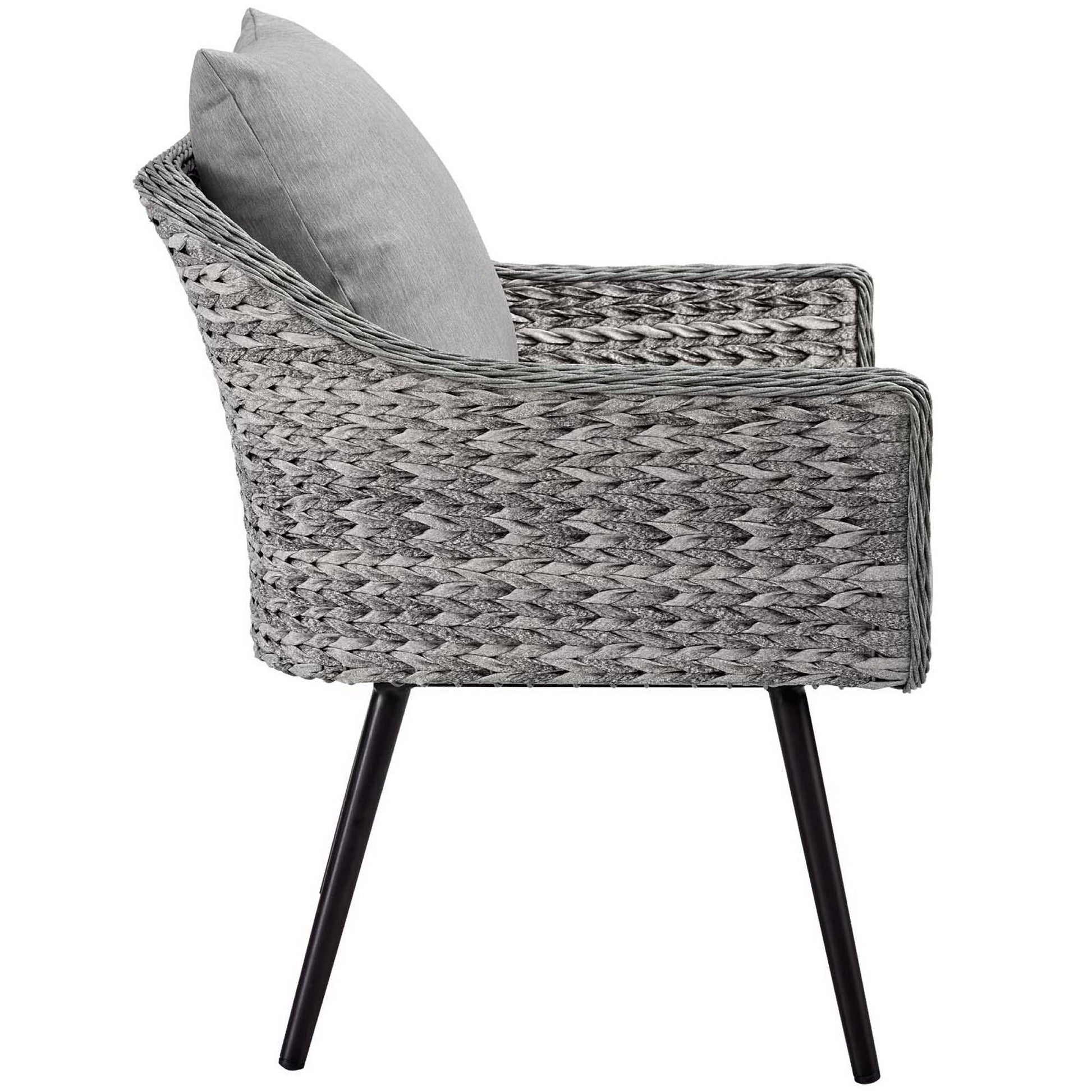 Gray woven outdoor wicker rattan armchair with black metal legs and a light gray back cushion