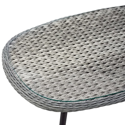 Round gray wicker top with glass insert and black metal legs; modern outdoor coffee table.