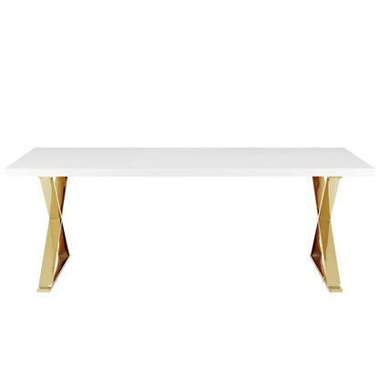 White rectangular dining table with gold angular X-frame legs.