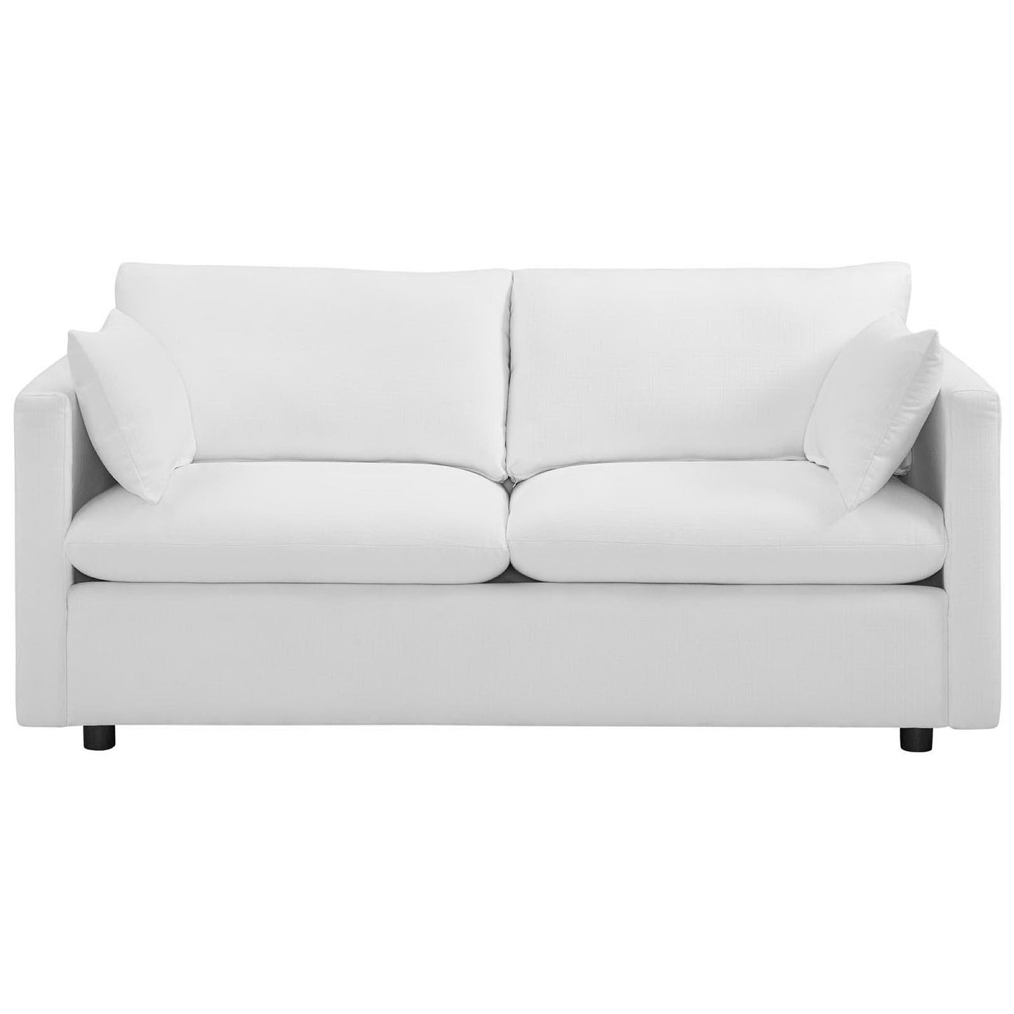 White fabric sofa with two-seat cushions, two back cushions, square arms, and low legs.