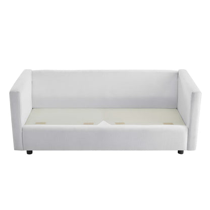 White upholstered fabric sofa with square arms and a low back; cushions in place.