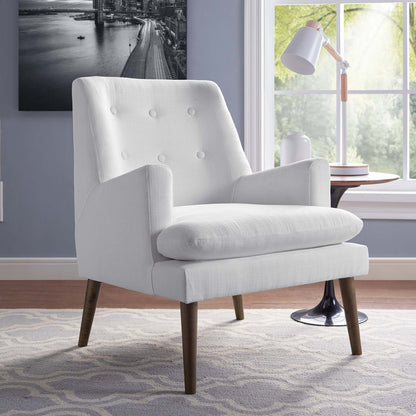 White fabric upholstered mid-century modern lounge chair with tufted back and cylindrical lumbar cushion, wooden tapered legs.