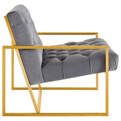 Grey tufted velvet accent chair with a gold stainless steel frame and square arms.