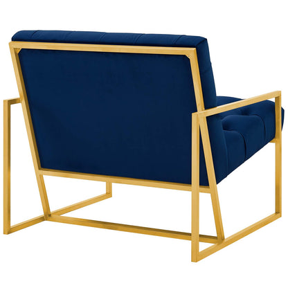 Navy blue velvet accent chair with a gold stainless steel geometric frame and tufted cushions.