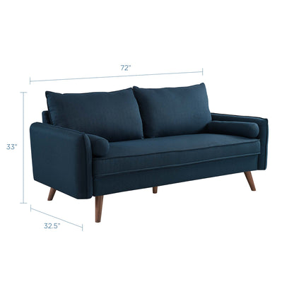 Deep blue fabric 72in mid-century sofa with two back cushions, two-seat cushions, rectangular arms, and tapered wooden legs.