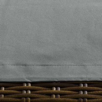 Gray textured fabric lid atop brown woven rattan base; outdoor patio furniture cover.