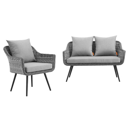Gray woven rattan outdoor chair and matching loveseat with light gray cushions, black metal legs, modern patio set.