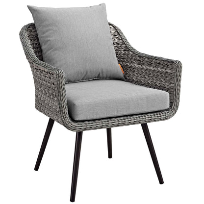 Grey woven wicker outdoor patio loveseat and armchair set with thick seat cushions, matching back cushions, and black tapered legs.