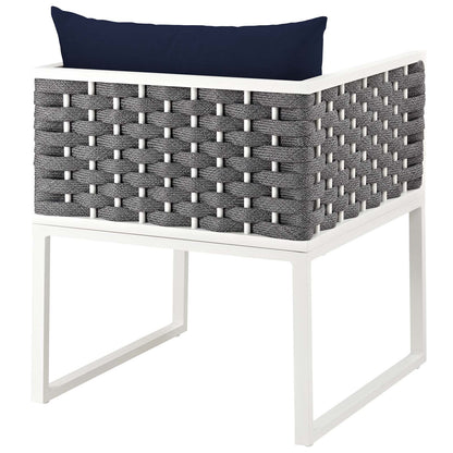 White aluminum outdoor dining set with navy cushions
