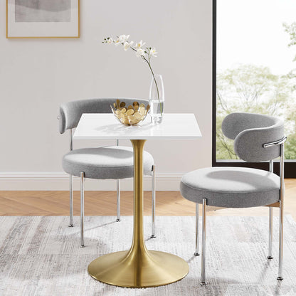 White 24" square wood dining table with a gold pedestal base.