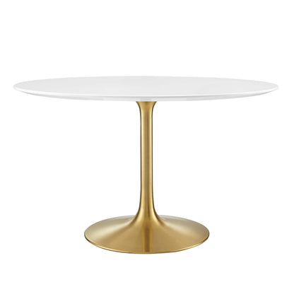 Round white tabletop with a gold-toned pedestal base; modern mid-century dining/accent table.