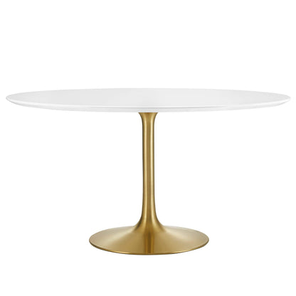 Round wood dining table with a white top on a gold metal pedestal base; sleek modern glam dining table.