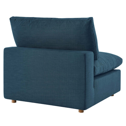 Azure blue fabric armless chair with cushioned back and seat, low wooden legs, modern style