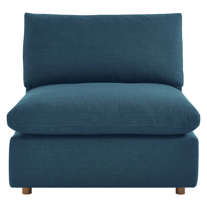 Azure blue fabric armless chair with tall back cushion, thick seat cushion, and short wooden legs.