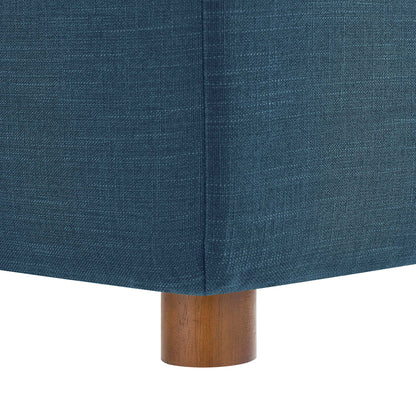 Azure blue textured fabric upholstery on an armless chair with short cylindrical wooden legs.