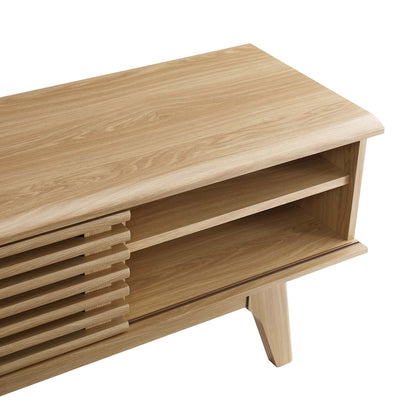 Oak-finish entertainment center / TV stand with open shelves, slatted left panel, rounded edges and angled legs.