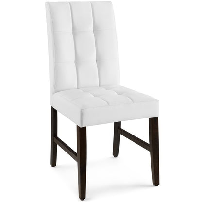 White tufted dining chair with padded back and seat, dark wooden legs.