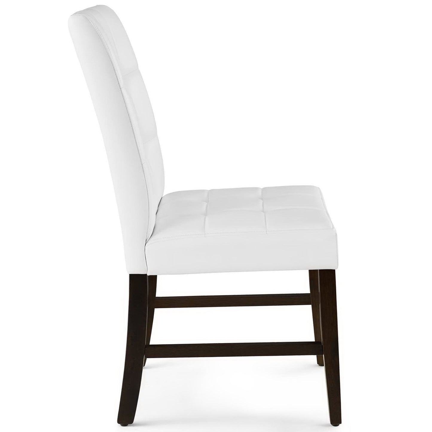Pair of white biscuit-tufted upholstered faux leather dining side chairs with dark legs.