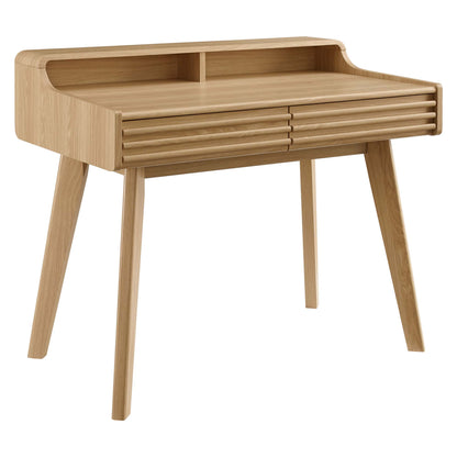 Oak wood desk with rounded upper shelf, two slatted drawers, and tapered legs; mid-century modern design.